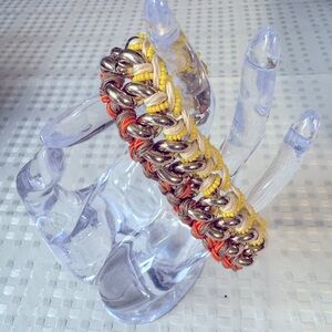 Gold Henri Bendel chain bracelet woven and beaded